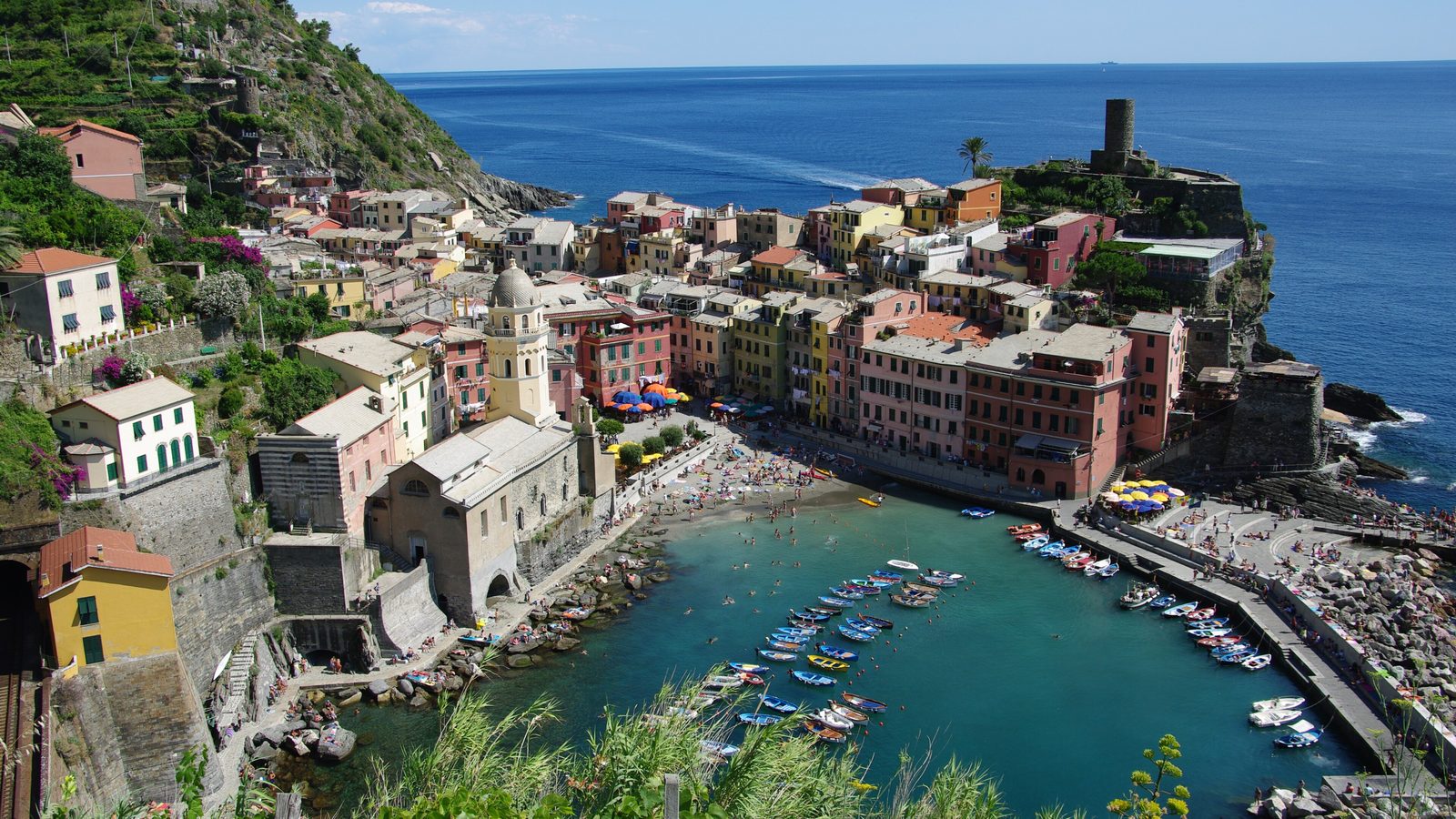 Cinque Terre Trail: Vernazza and its harbour seen from the coastal path above the village, Liguria