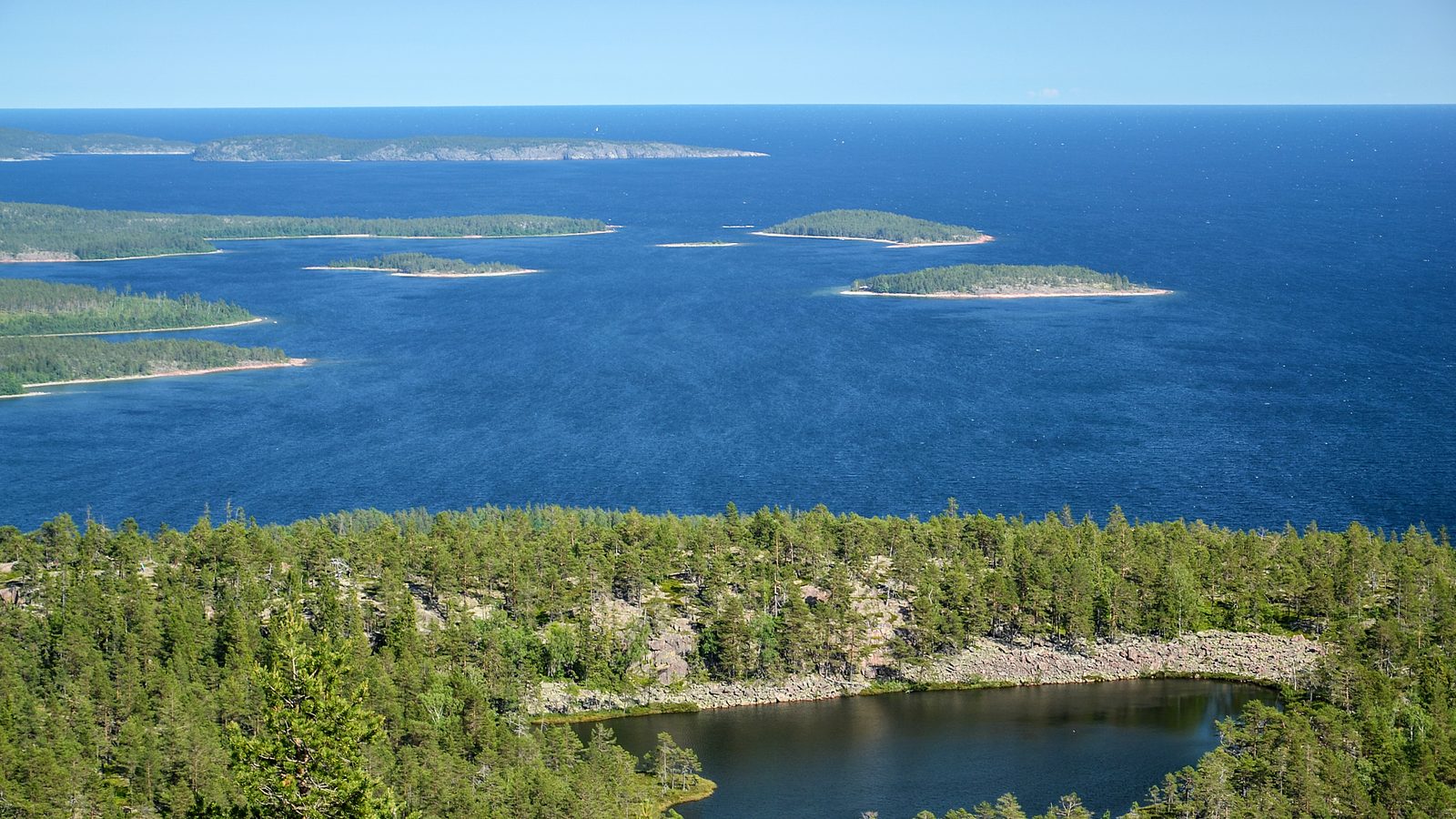High Coast Trail: forested hills, bays and islands of the High Coast World Heritage Site seen from above, Västernorrland, Sweden
