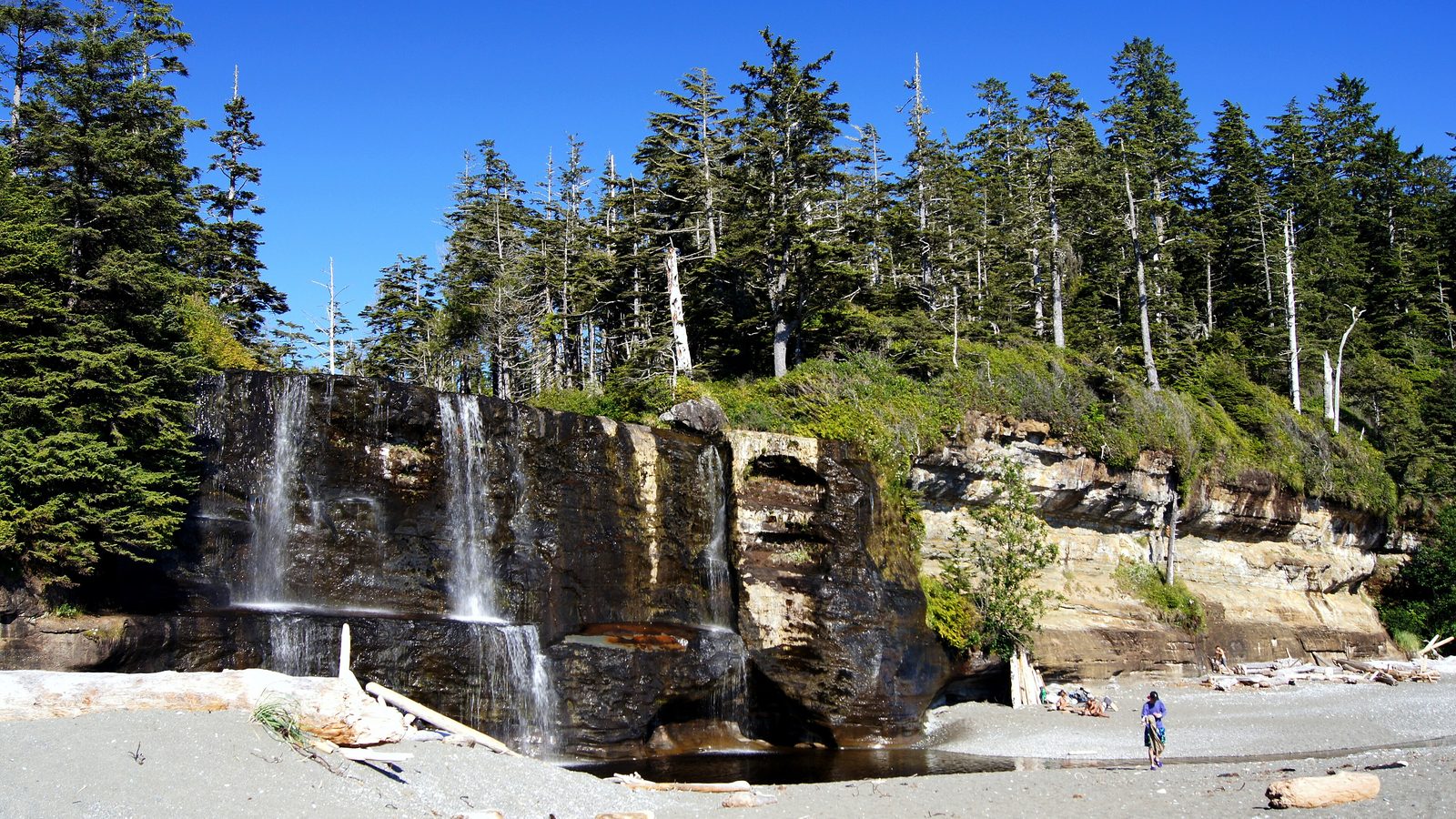 West Coast Trail: Tsusiat Falls pouring onto the beach, Pacific Rim National Park Reserve, Vancouver Island, British Columbia